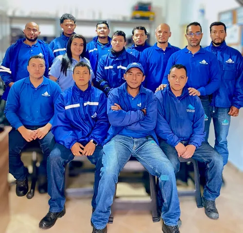 Grandmother and granddaughter laughing together while playing on the grass